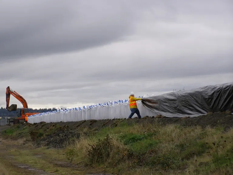 verhoging dijkkruin met big bags